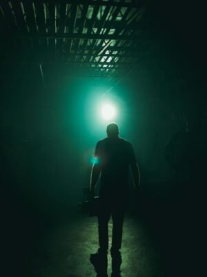 Man Standing With Blue Light