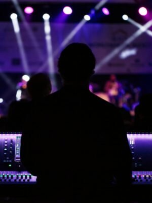 Silhouette Photo of People Beside Monitor